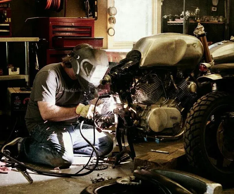 Small details make a big difference. Removing rust and restoring the exhaust finish using specialist metal treatment.